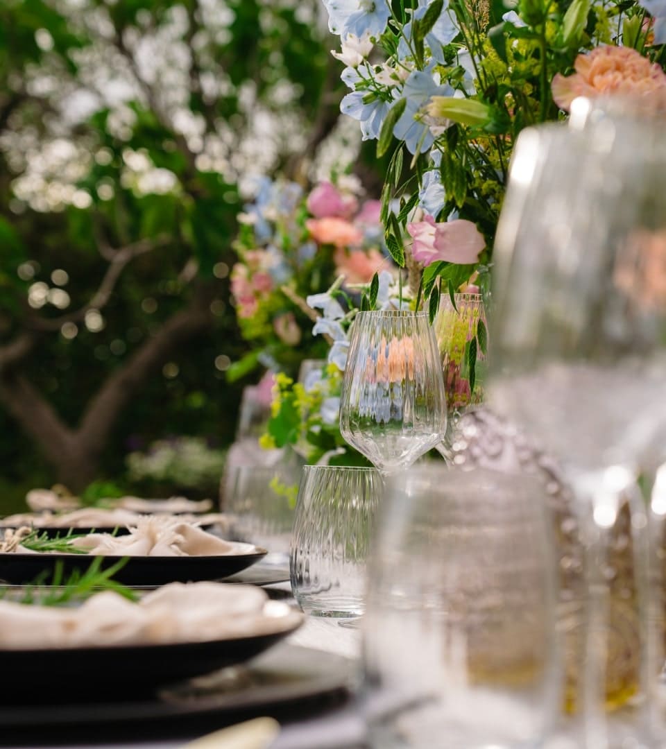 A young lady is holding flowers
