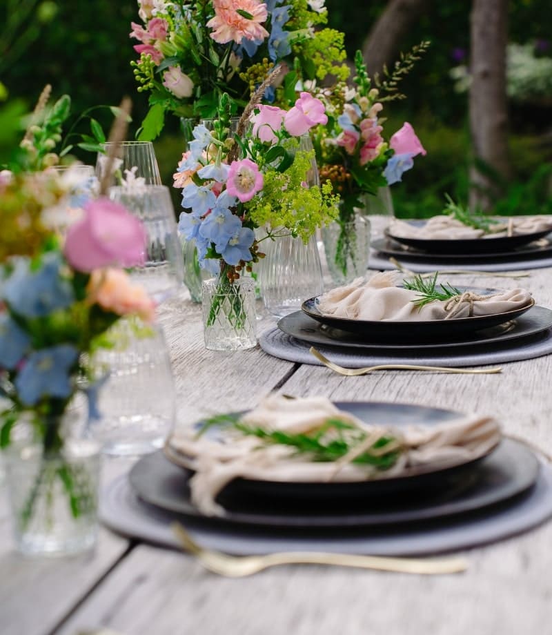 plate and flowers on event table